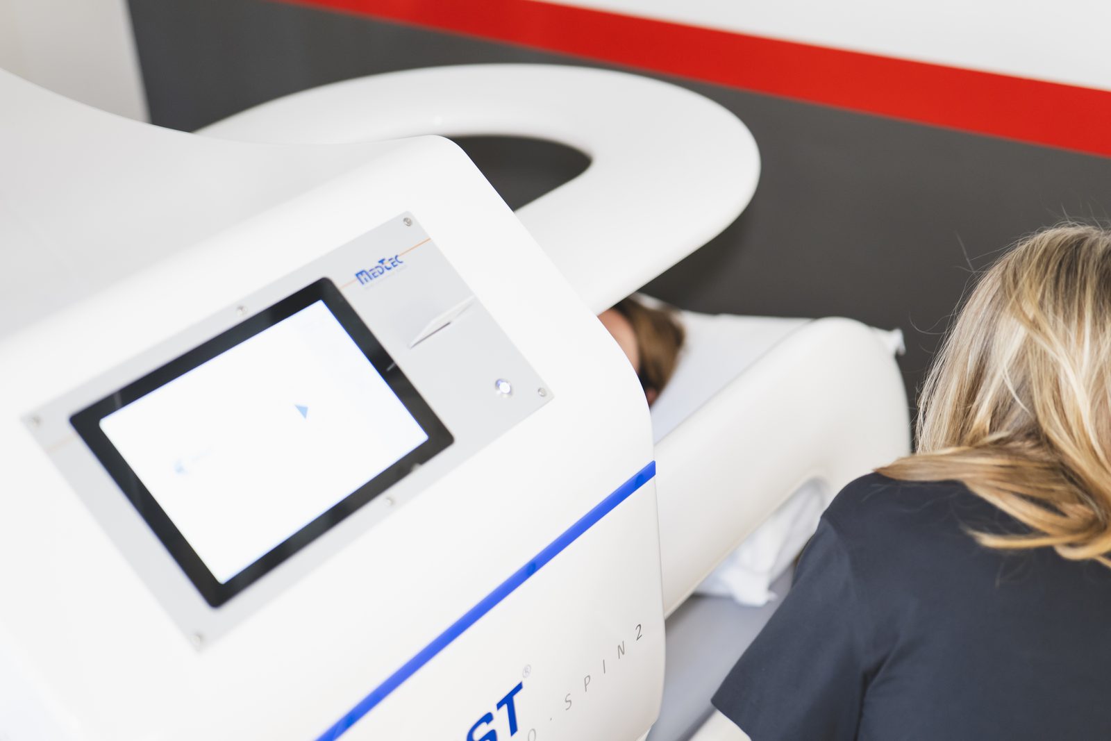 A patient on the MBST therapy machine at At The Core, Primrose Hill